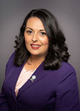 Photo of Olivia Diaz wearing purple blazer