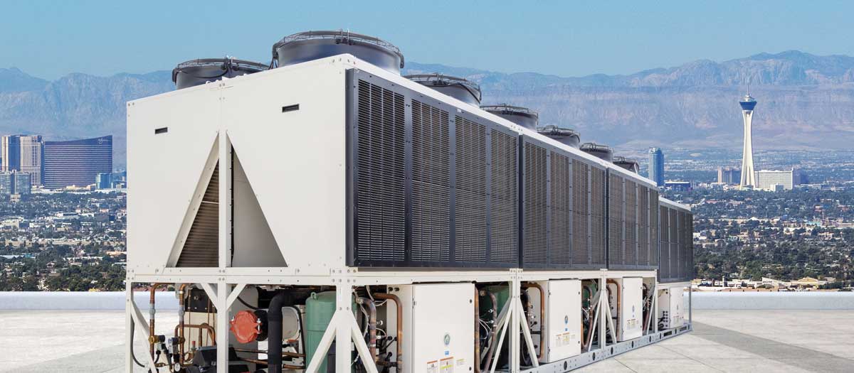 Composite image of an evaporative chiller on a rooftop overlooking the Las Vegas Strip skyline