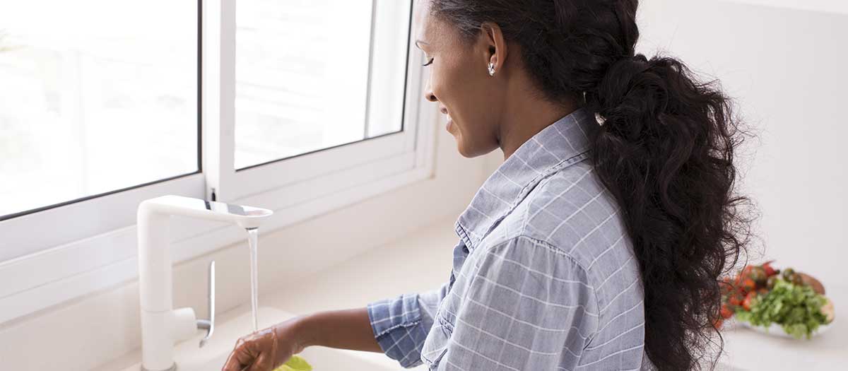 Woman at sink