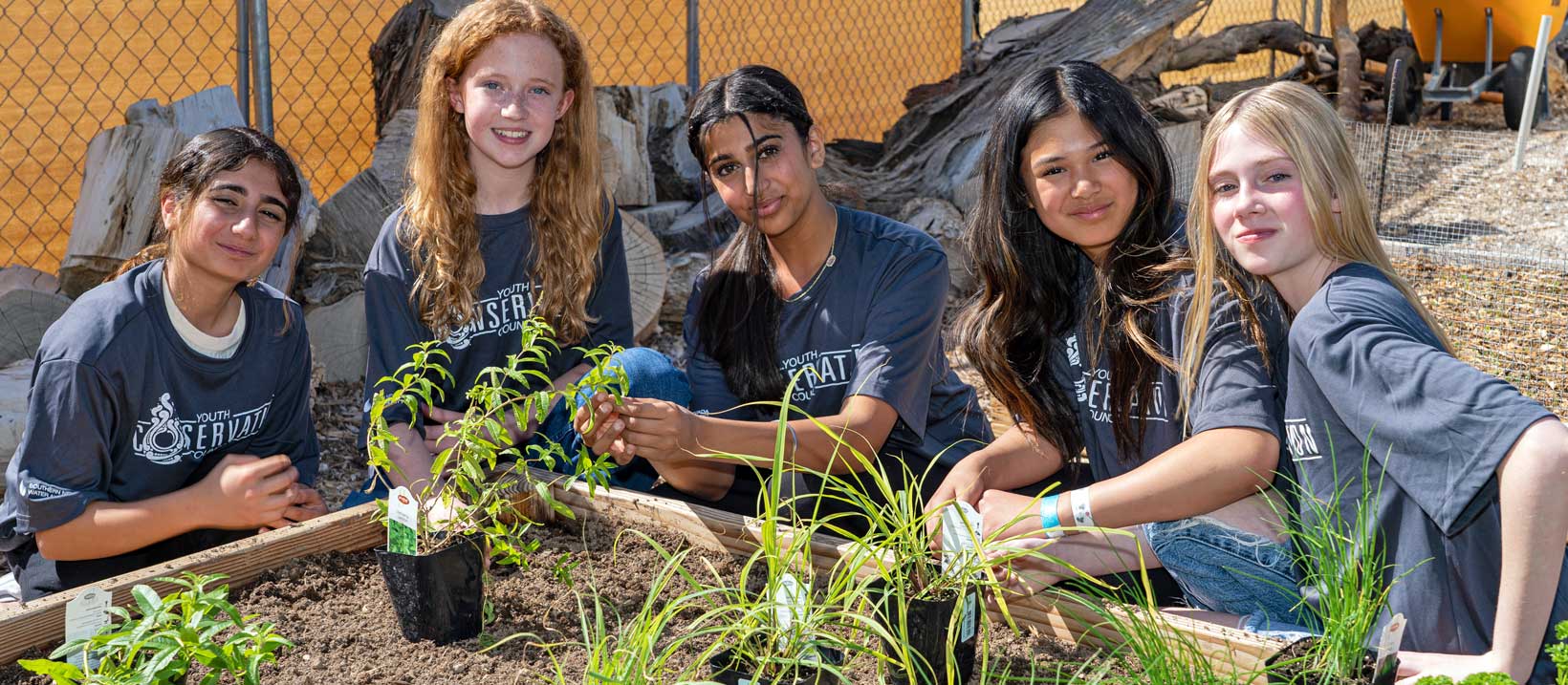 Youth Conservation Council members at a planting event